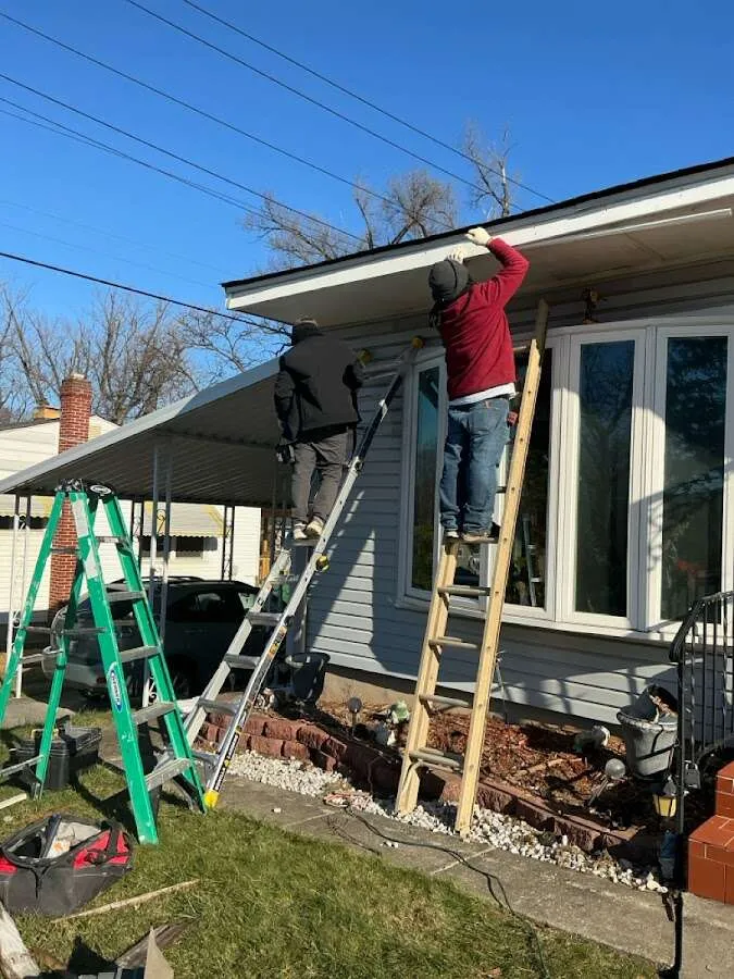 Restoration crew performing exterior repair in Centerville